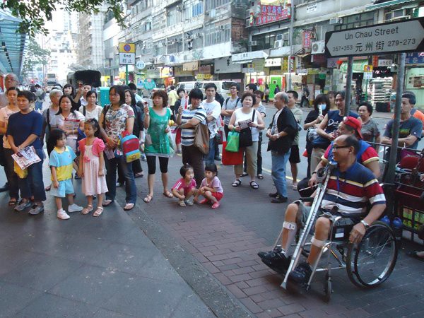 Well attended street meeting to hear 'Long Hair' Leung Kwok-hung supporting Sally Tang's campaign. 