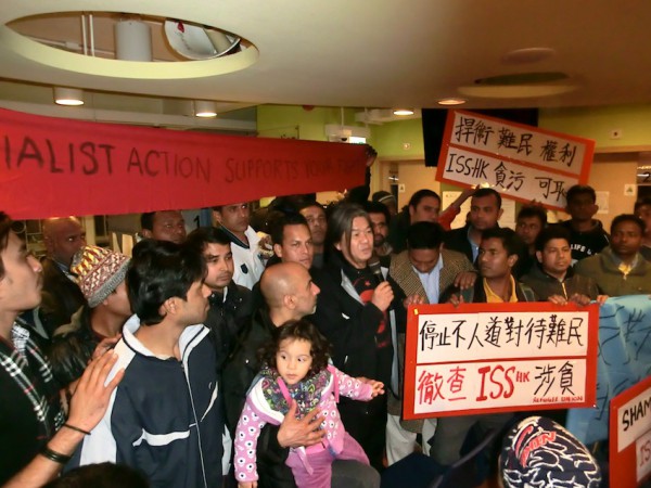 'Longhair' Leung Kwok-hung greets the Prince Edward occupiers