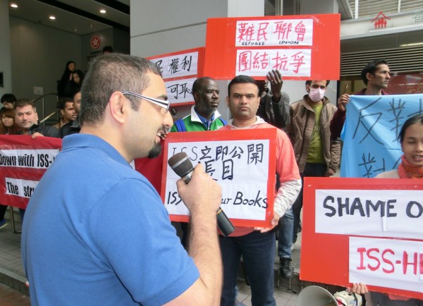 Raymond of the Refugee Union addressing the Wan Chai protest