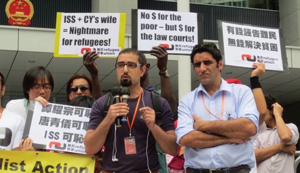 Raymond of Refugee Union addresses demonstration outside Legislative Council.