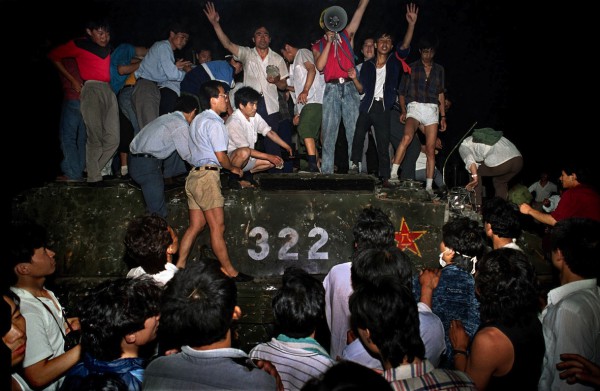 Tank captured by protesting youth and workers.