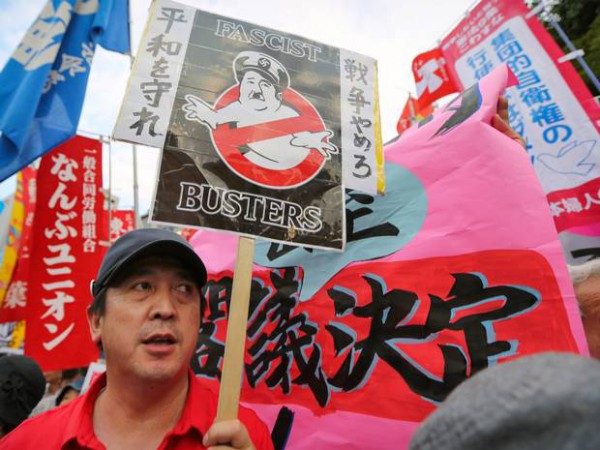 Mass protest in Tokyo against Abe's reinterpretation of the constitution.