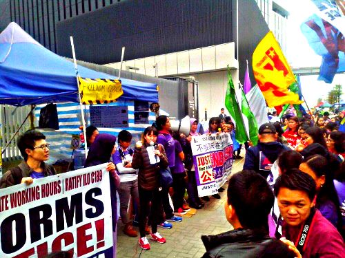 Sally Tang Mei-Ching from Socialist Action speaking at migrant worker demonstration