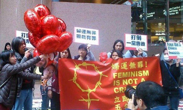 LSD's Leung Kowk-hung releases balloons carrying the faces of the five women activists.