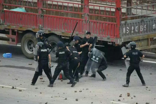 Riot police blamed for the violence in Linshui.