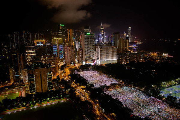 Hong Kong commemorates the June 4 massacre with a massive candlelight vigil.