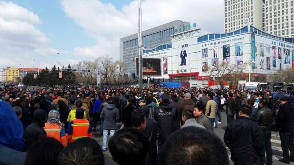 Mineworkers and their families protest in Shuangyashan, 11 March 2016.